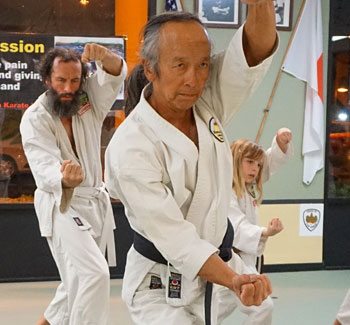 adult men practicing martial arts